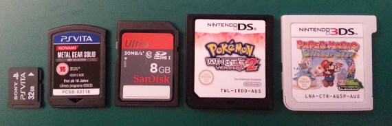 From left: Vita memory card, Vita game cartridge, standard SD card, DS game cartridge, 3DS game cartridge