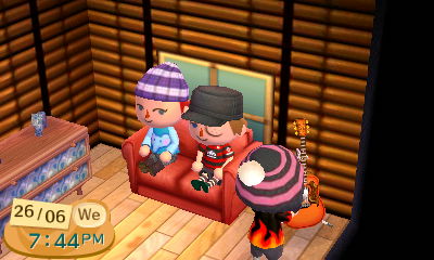 This is him trying to play guitar.