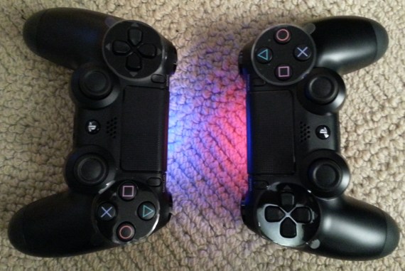 Player 1 lights up in blue, Player 2 in red.